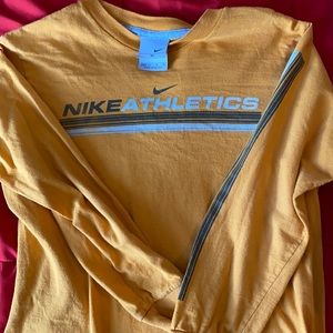 Yellow long sleeve Nike athletics tee